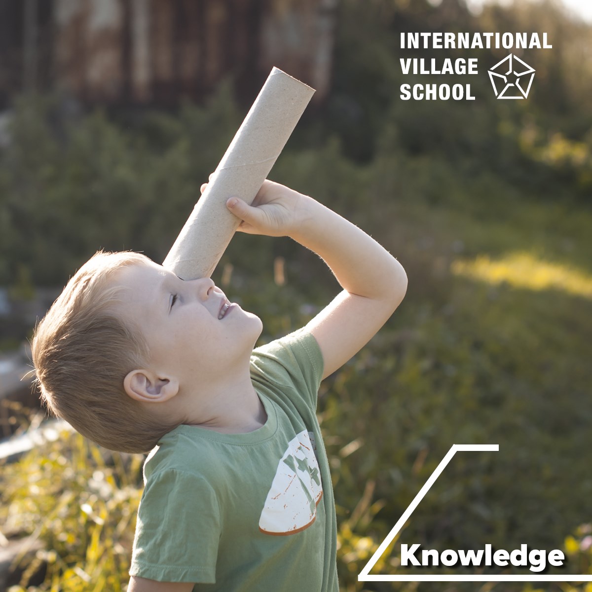  A banner image of a young boy playfully using a cardboard tube as a telescope, gazing up at the bright daytime sky with curiosity and wonder.